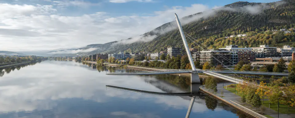 Illustrated view of the Drammenselva with the Ypsilon Bridge, modern riverfront, and wooded valley slopes